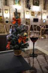Naklejka na ściany i meble A small tree. Table decoration for Christmas and New Year