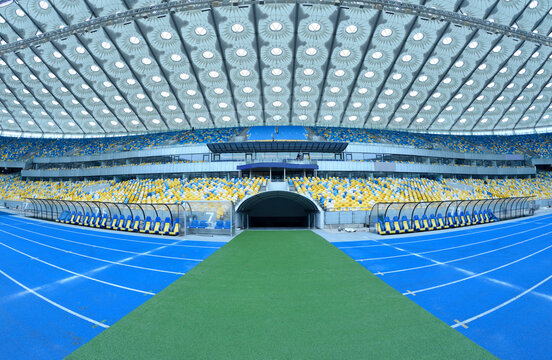 Empty Soccer Field Of The Stadium, Tunnel From Where Football Players Come Out, Seats For Trainers And Substitute Players