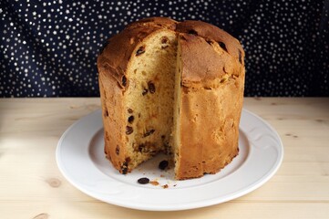 Easter cake with raisins on a white plate 
