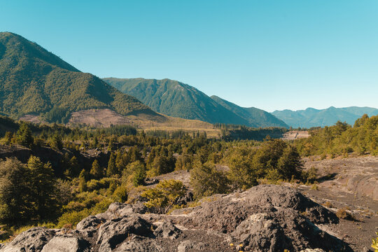 mountainous landscape with volcanic soil and forests