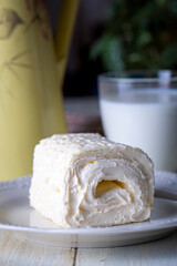 Turkish creamy dairy product. Clotted cream (butter cream) for Turkish breakfast with glass of milk. (Turkish name; kaymak)