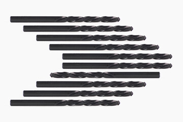 Directional arrow, abstract, created by photo composition, with photographs of drills, industrial and hard looking. One of the bits faces upstream, facing the opposite direction.