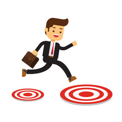 Businessman jumping to big target