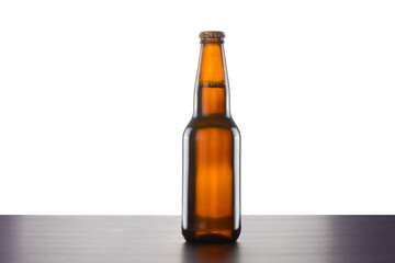 A brown beer bottle with no label isolated on white
