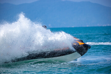 A man driving a jet ski