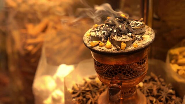 Gold Souk market. Dubai, UAE. Burning incense on coals