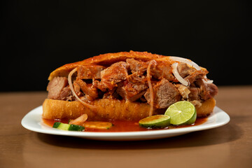 Drowned pork cake with sauce.