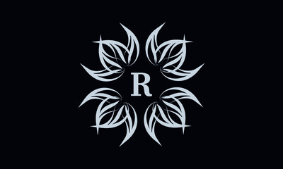 Vintage exquisite floral monogram with the letter R as a sign of business, boutique, shop, cafe, hotel, etc. Gray sign on a dark background