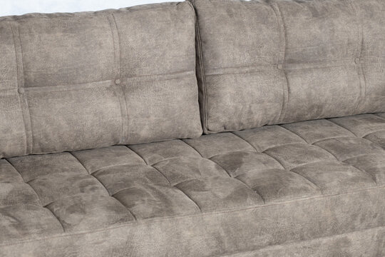 Closeup Shot Of A Brand New Dark Gray Sofa