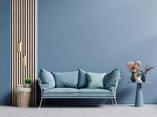 Modern living room mockup dark blue wall with blue sofa and decor.