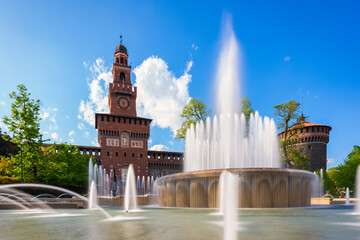 Main entrance to the Sforza Castle - Sforzesco castle and fountain in front of it,long exposure...