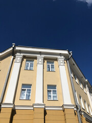 Soviet building against the blue sky, Russia Altai region, Barnaul 20.04.2021