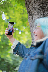 person taking a picture with phone