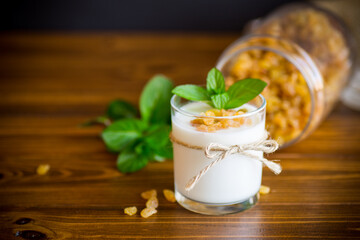sweet homemade yogurt with raisins in a glass