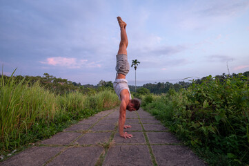 Man practice Yoga practice and meditation outdoor