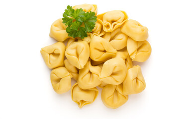 Raw homemade pasta,tortellini with herbs.