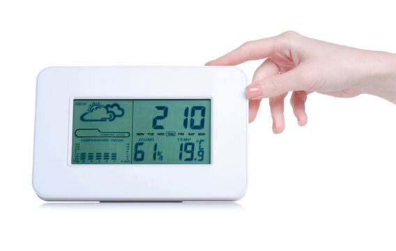 digital weather station in hand on white background isolation