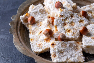 Traditional delicious Turkish dessert; cezerye with hazelnuts and coconut (Turkish name; Findikli madonna)
