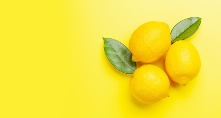 Fresh ripe lemon on yellow