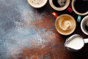 Obraz na płótnie Canvas Many cups of coffee on stone table