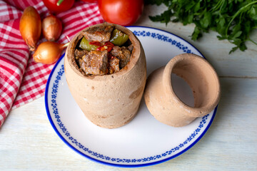 Authentic Turkish Testi Kebab cooked in earthenware waterjug, Turkish name; Testi kebabi