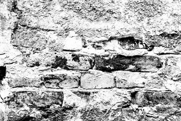 Texture of a brick wall with cracks and scratches which can be used as a background