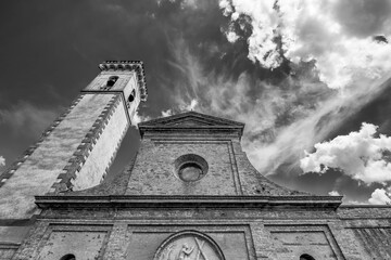 Black and white view of the bell tower and part of the facade of the Santa Croce church in the...