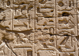 Ancient Egyptian hieroglyphs on the wall in Luxor in Egypt