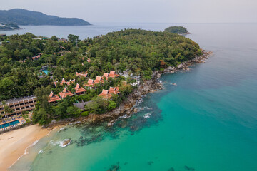 Fototapeta premium Aerial view of cape between Karon and Kata Beach in Phuket. Beautiful scenery beach of Andaman sea. Famous tourist destination in Thailand