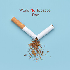 A broken cigarette and the text world no tobacco day on a blue background.