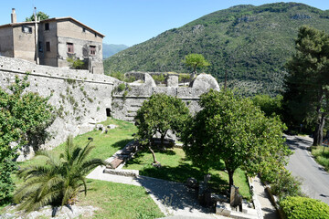 Fototapeta na wymiar Sermoneta, Italy, 05/10/2021. The ancient medieval walls that surround the town.
