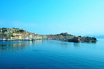 Fototapeta na wymiar Italy-view from the ferry on town Portoferraio on the island of Elba