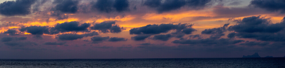 Naklejka na ściany i meble Sunset from Saona beach in Formentera (Spain)