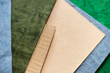 various sheets of textured construction paper