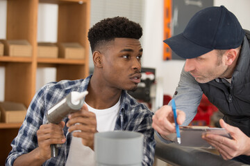 man working with silicone pipes