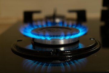 stove gas burner. blue flame.