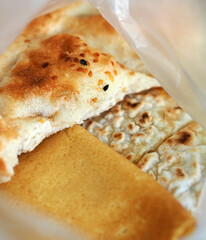 stale bread pieces in the bag from the previous day,