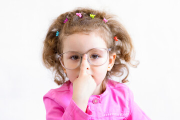 closeup portrait of little cute smart girl in funny big glasses. Training, education. back to...