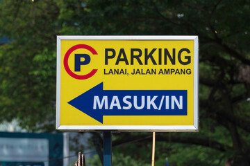 Colorful traffic and informational notices in Malaysian language