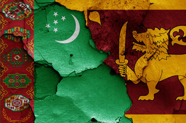 flags of Turkmenistan and Sri Lanka painted on cracked wall