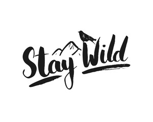 Stay wild lettering handwritten sign, Hand drawn grunge calligraphic text, outdoor hiking adventure and mountains exploring, Vector illustration