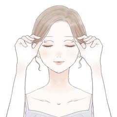 目の上をマッサージする女性