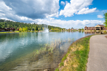 Fototapeta premium Riverstone public park and lake during spring in the Riverstone commercial development in downtown Coeur d'Alene, Idaho, USA