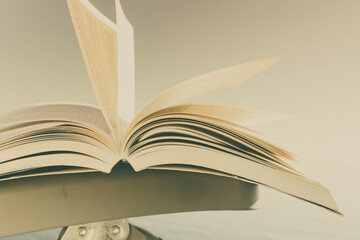 Open book outdoors. Reading