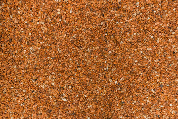 赤い砂利　Pebbles dyed red near the track