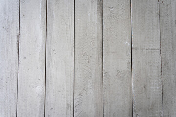 Vertical grey wood planks background wall. Copy space, simple texture, hardwood surface concepts