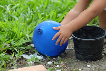 child playing with ball