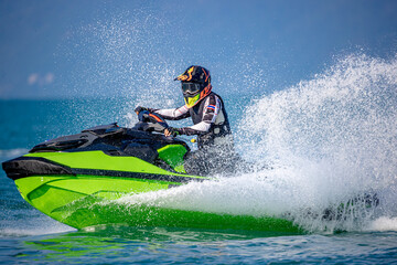 A man driving a jet ski