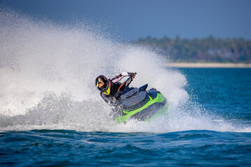 A man driving a jet ski