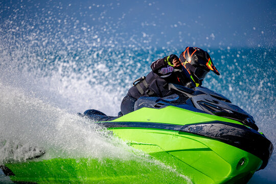 A man driving a jet ski